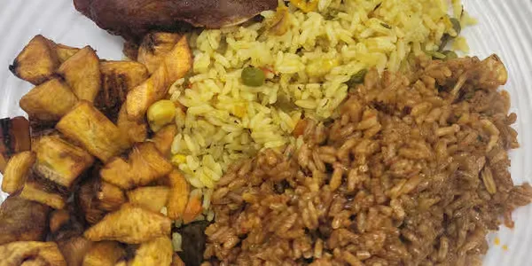 Nigerian jollof rice and fried rice combo plate in Winnipeg