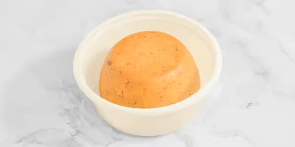 Steamed Nigerian moi moi bean pudding side dish in Winnipeg